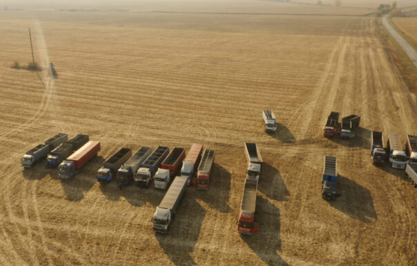 Top view of grain trucks on the field.